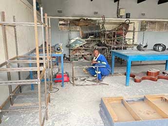 A student learning welding at the Buchi Vocational Training Centre