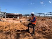 A member of trafigura's diligence team on site