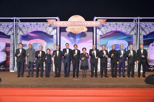Dinner attendees on the stage