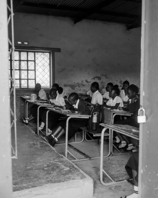 Children studying in a classroom yet to be rehabilitated