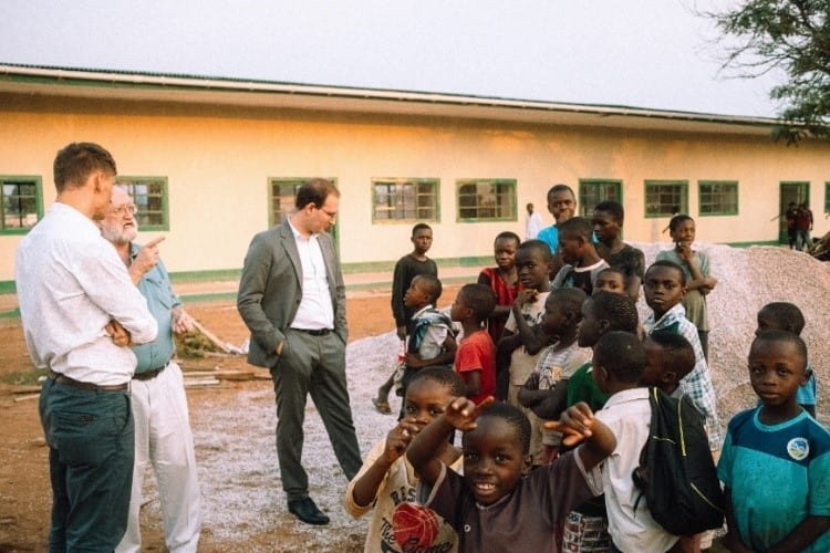 FCA delegation visiting a rehabilitated school funded by the LME